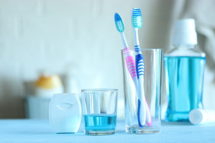 Toothbrush, dental floss, and mouthwash for long-term dental implant aftercare